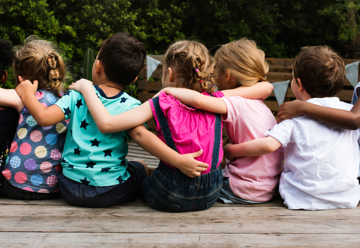 kids arm in arm